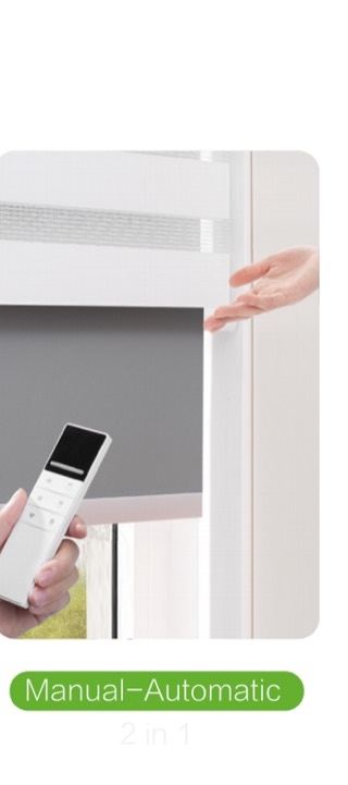 Hand-operated blind that also accepts a remote, demonstrating manual–automatic operation.