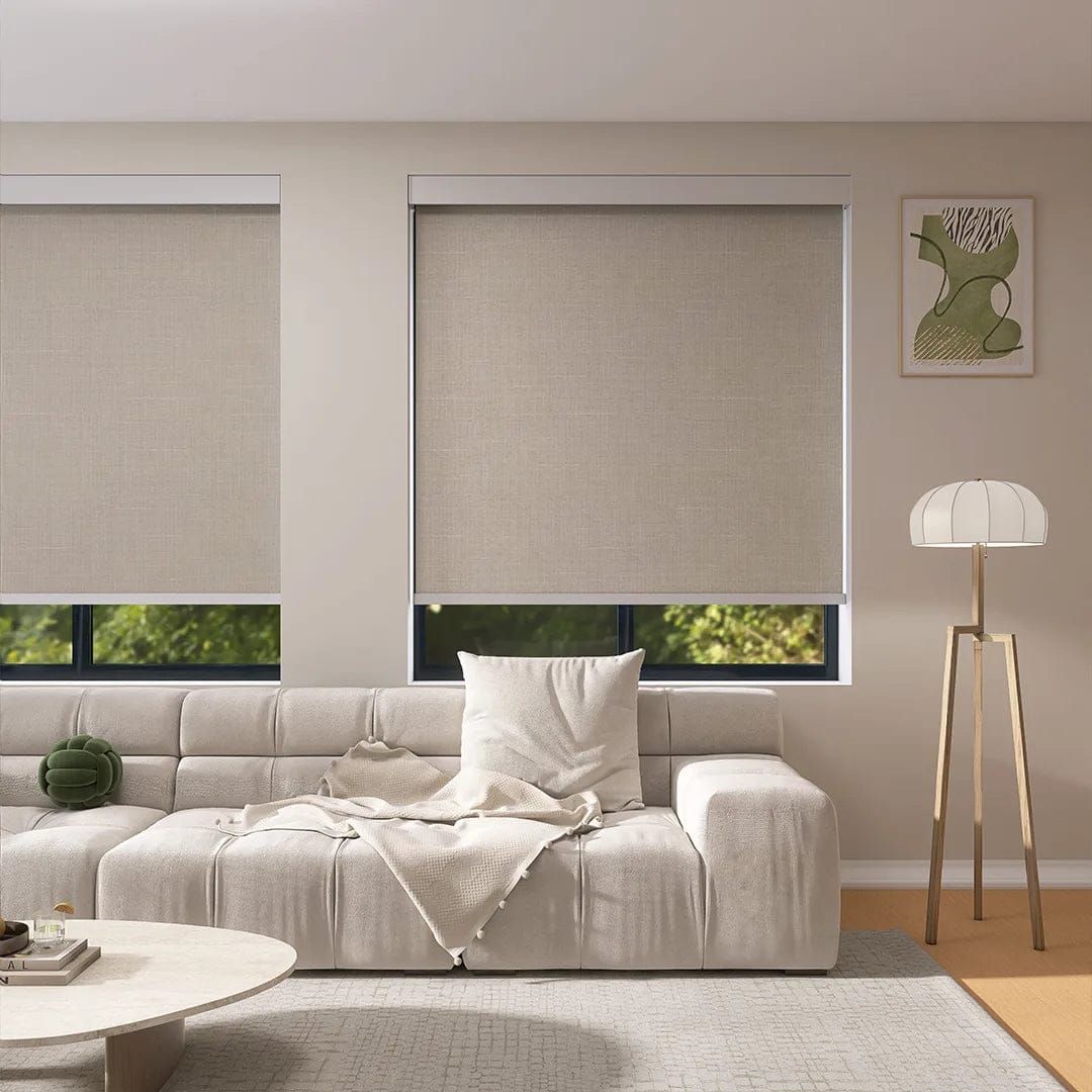 Motorised roller blinds in a modern living room.